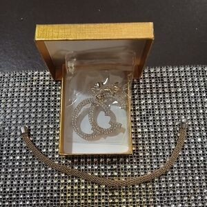 Elegant Gold Guess Women's Jewelry Set